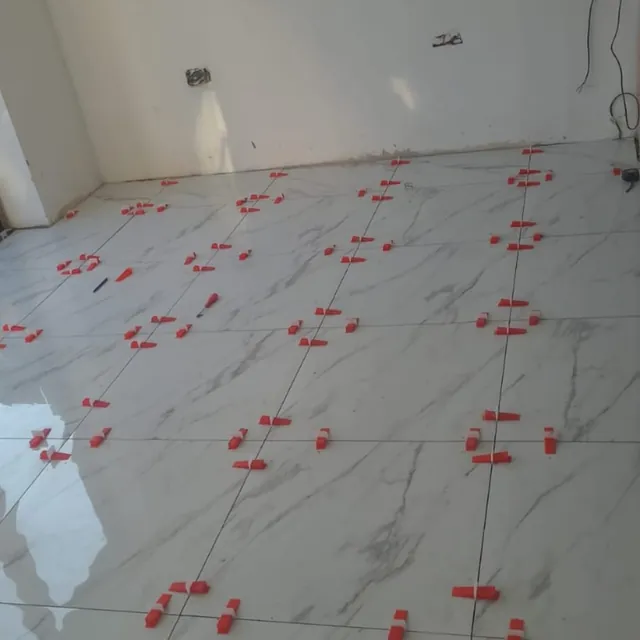 Tiling, levelled and spaced, mid-job